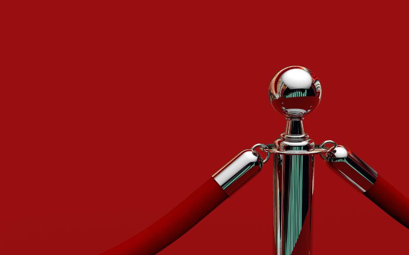 velvet rope on red background
