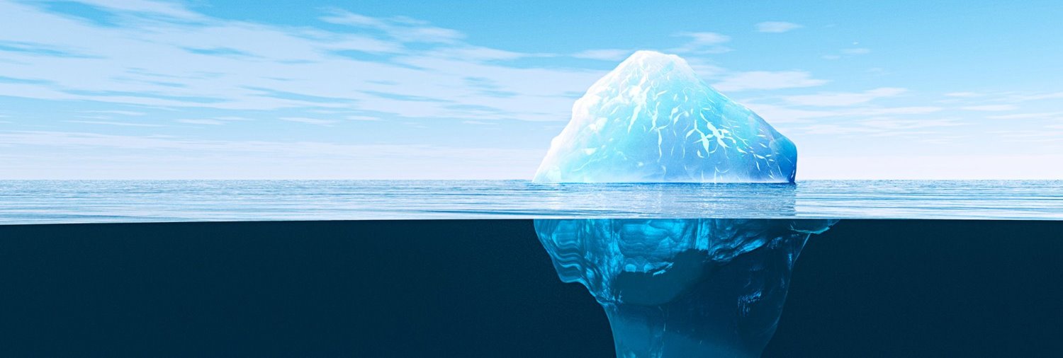 iceberg showing portion above the water line and portion under it