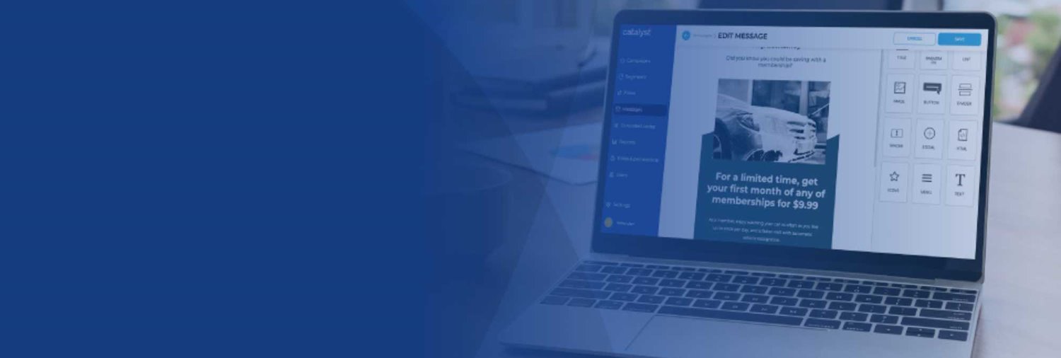 laptop on desk with Catalyst marketing automation platform on screen