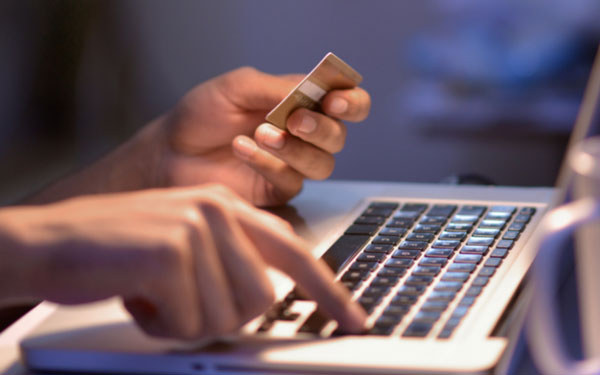person making an online purchase