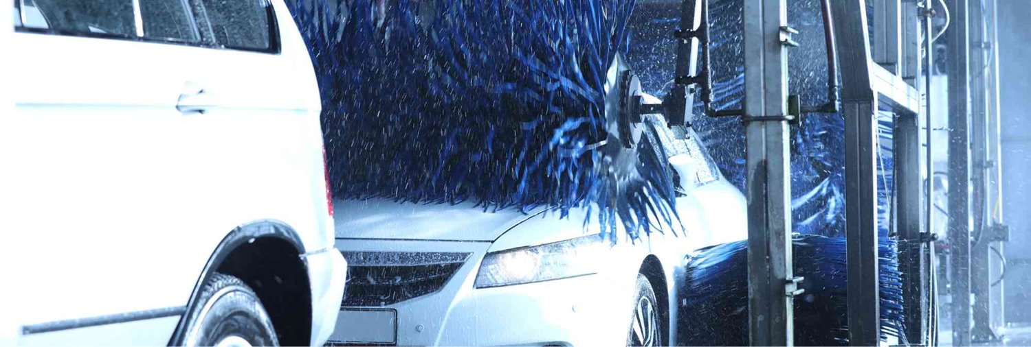 Multiple cars in car wash tunnel