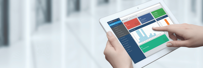 car wash operator viewing sitewatch web reporting on tablet