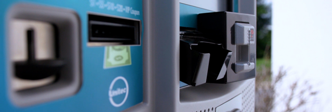 close up of unitec car wash pay stations